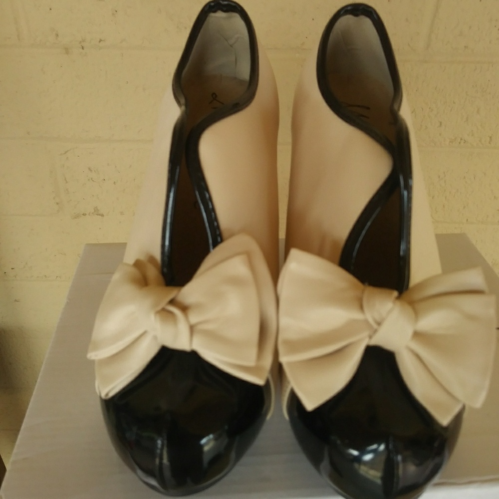 New Ten and black bootie heels